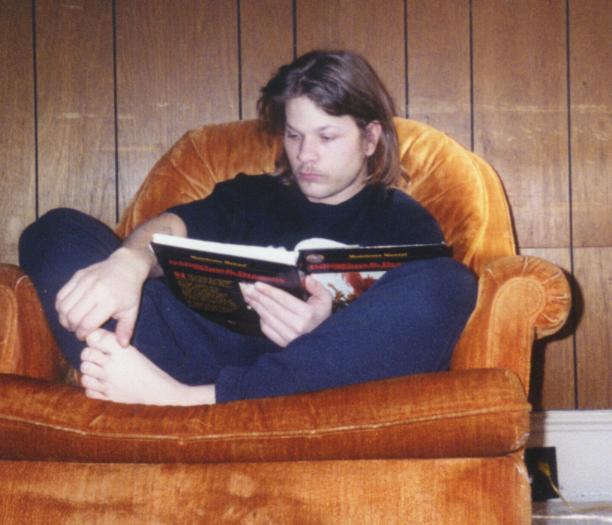 Nigel reading a book.