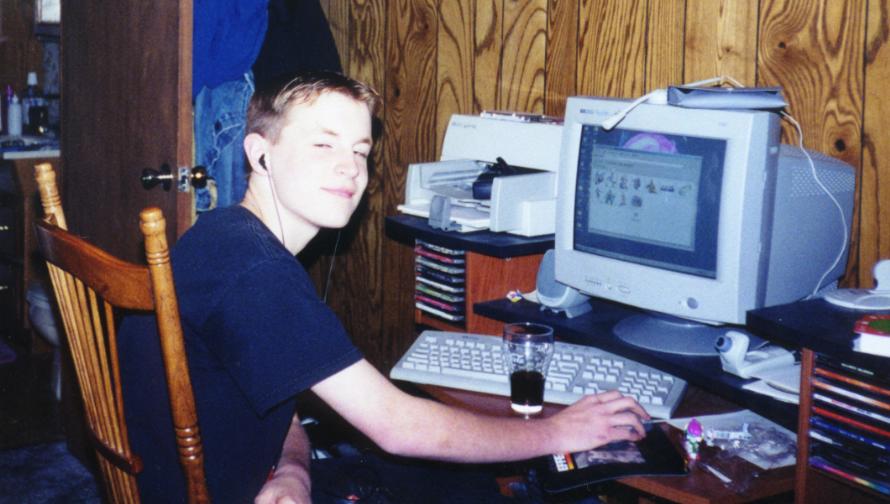 Tyler looking stoned in front of his computer.