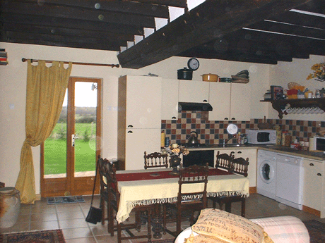 Kitchen/dining area with doors to patio and garden