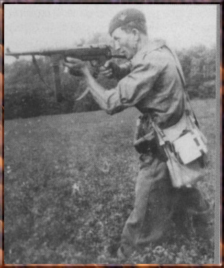 Romanian paratrooper armed with the MP40 submachine gun during a training exercise. Summer 1944
