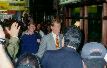 hurrying thru the crowd