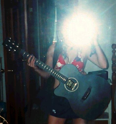 A Girl and her Guitar is a beautiful thing...