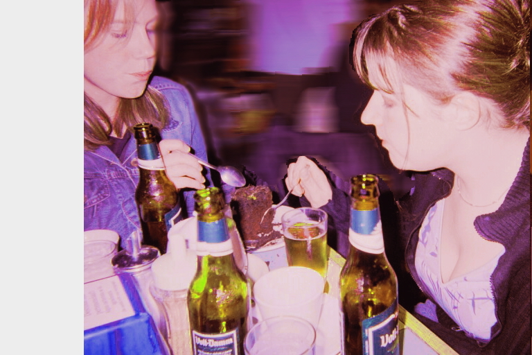 Lizzie and Sue tuck in during our trip to Barcelona
