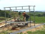 cutting small cypress log