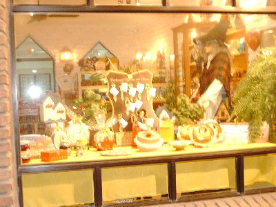 The Tia Beryl shop further along the coastline, with Welsh woman in the window