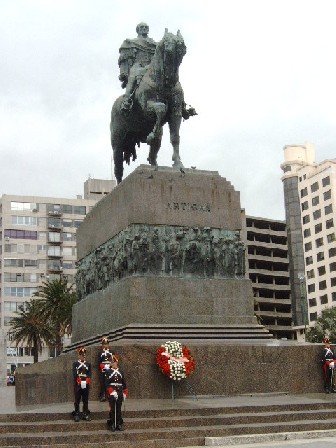 Statue of national hero, Artegas, in Plaza Libertad. Tributes to celebrate Columbus Day