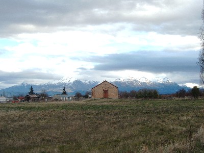 Splendid Isolation. Welsh Church with Andes in background