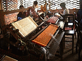 silk weavers at work