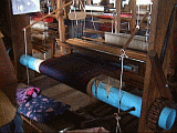 it was extremely hot and stuffy inside the loom room