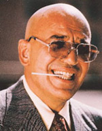 Telly Savalas is Lt. Theo Kojak