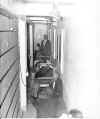 Early 1960's cell  Sheriff hughes in background.jpg (61394 bytes)
