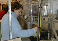 An IDEAs member working at the Bruicliddich Distillery