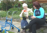 Two IDEA members enjoying the garden.