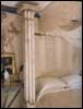 An ethereal bedroom hung with antique lace