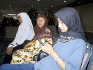 Still at the airport.  Flight delayed 2 hours!!  Mak Lang Su, Wan Teh & Mama