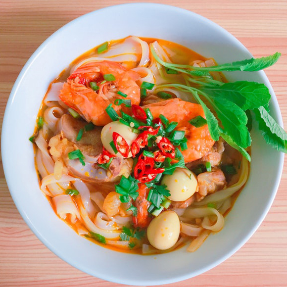 noodle soup with shrimp in a white bowl