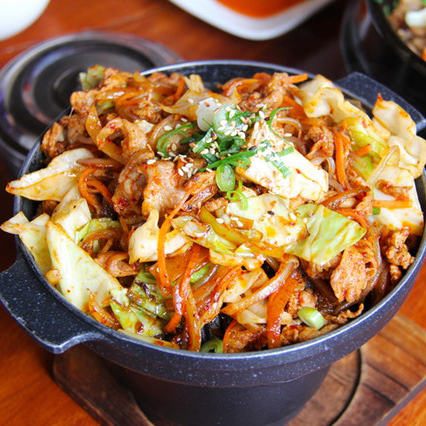 asian dish in a black bowl