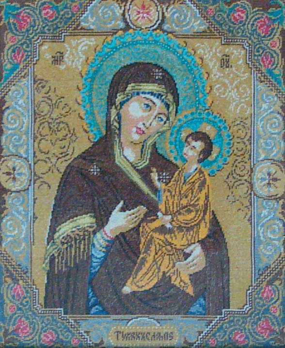 god_mother_with_a_child.jpg (88186 bytes)