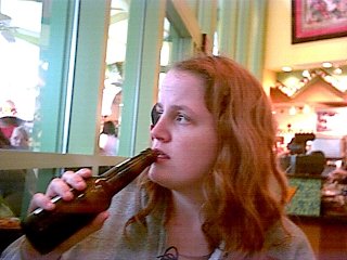 Denise drinking a beer