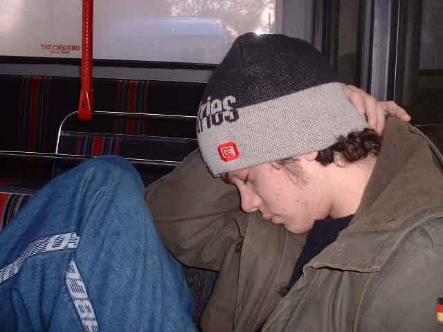 Stu having a sleep on the bus.