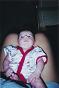 AJ sitting up on Adrienne's lap