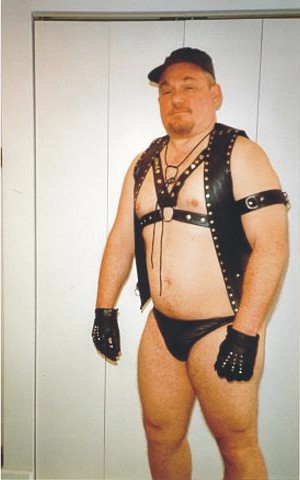 See that armband? Well, it's really a collar... for you, slave!