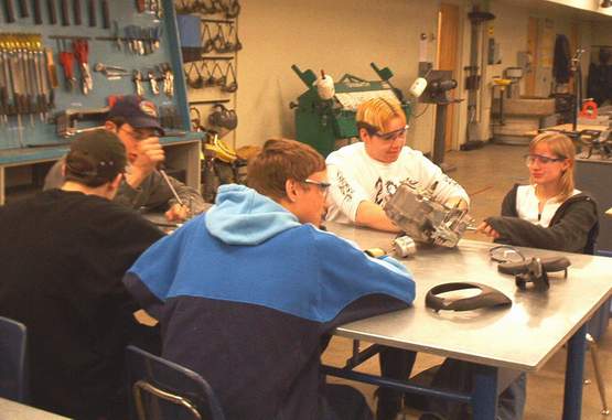 Students experience taking apart a 4-cycle Tecumseh.