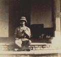 John Wright holding a small puppy,barely visible,India 1915