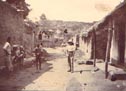 Soldier in village street, India 1915