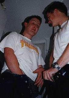 Mikkel seems amused as Micki puts his hand down his pants