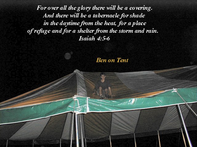 Ben gets on top of tent to close rain flaps. Aug 2002
