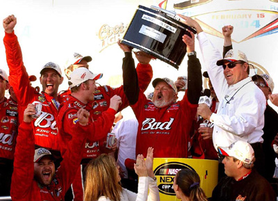 Jr and Tony Eury, Sr. celebrating in Victory Lane at the 2004 Daytona 500. &copy; AP
