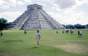 The pyramid at Chichen Itza, with Maggie posing for the camera.