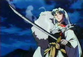 Sesshy holds the Tetsusaiga using a human arm he got from Naraku. Lost yet?