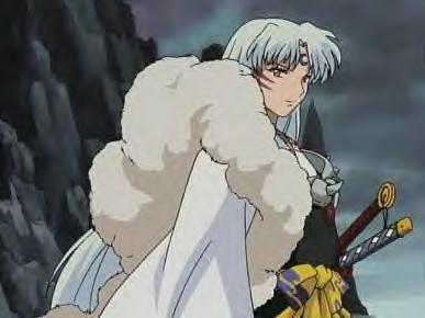 Notice, he's carrying 2 swords....what a weirdo.