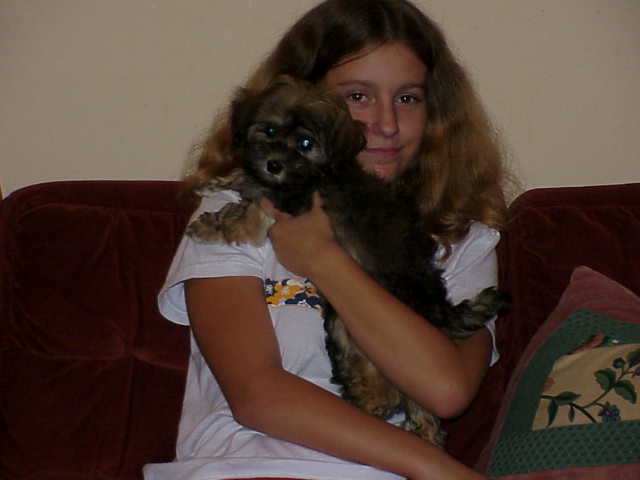 This is me and one of my puppies named Fiona.