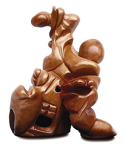 Metamorfosi - terracotta con patina bronzea, cm.26x24x7, A. 2000
