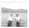 Joe Gross and Thomas Kekahio with coast of Viet Nam in background