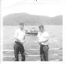 Joe Tucker and Thomas Kekahio  with coast of Viet Nam in background