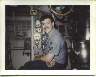 Joe Tucker standing Top Watch in forward fireroom