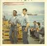 Luther Byrd and Joe Tucker on fantail taking a coke break