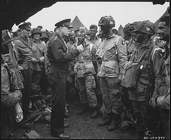 General Isenhour with Airborne Troopers shortly before take-off on D-Day. (Nat. Archives)