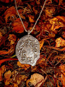 Mantra.Sterling silver. 1.25 x 1 inch