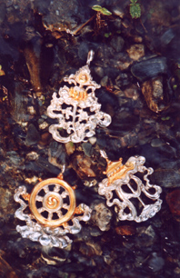 Lotus, umbrella of protection and wheel of Dharma. sliver and 24k gold plating. Hand made