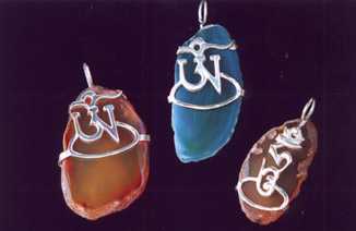 Silver Om and Hum over green and yellow Agates. 0.5 x 1.5 inch