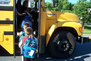 Keep moving....plenty of seats in the rear of the bus!