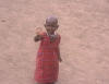 Maasai child waving out to us