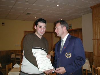 Ishmael being presented with Coaching Certificate by Craig Griffin - January 2001