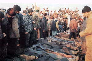 rebels trieng to identify their friends killed in battle with Russians