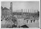 Inmate construction crew standing on tower